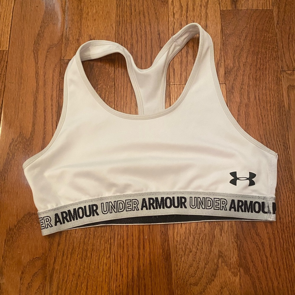 white under armour sports bra with a cut out in the back size small